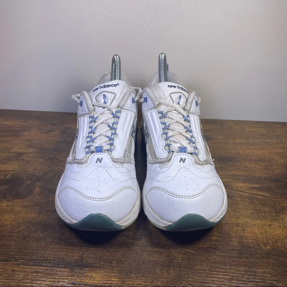 New Balance White Athletic Sneakers with Blue Accents